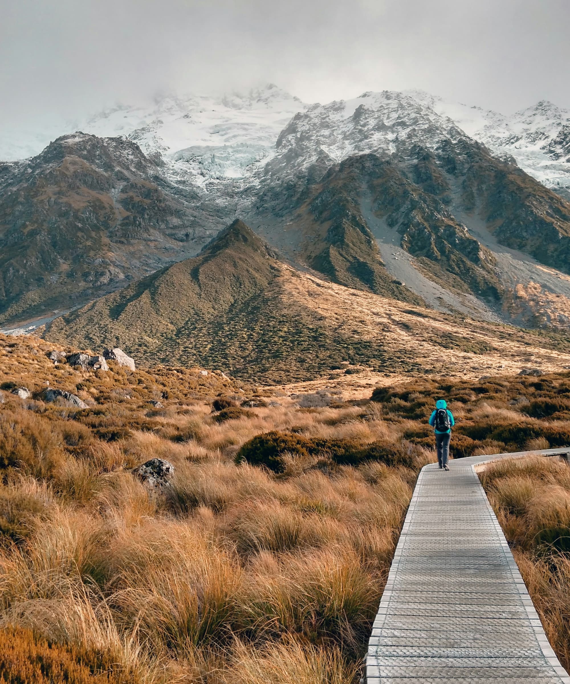 Person hiking in the snowy mountains